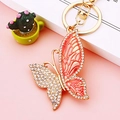 Golden butterfly keychain with orange enamel wings and sparkling rhinestones - Pink Pattern Butterfly