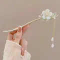 New Chinese style metal hair pin with white magnolia flower and golden tassel charm - Magnolia