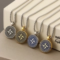 Detail of four stainless steel compass necklaces in silver and gold with colorful resin - Compass Style A / Steel Black