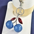Blue glitter cherry keychain with red metal leaves on a silver keyring for bags - Blue Cherry