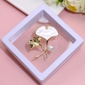 Elegant gold ginkgo leaf brooch with white pearl in a premium white floating display box - XZ188-Ginkgo Pearl-Boxed