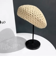 Detail of beige straw woven beret on a display stand showing the breathable mesh texture - M (56-58cm) / Beige