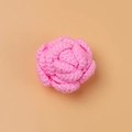 Detail of a pink hand-crocheted rose flower with textured yarn petals and soft finish - Bright Pink Rose Flower Head
