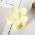 Pale yellow flower hair claw clip with matte resin finish and bead center detail - 7cm / Cream