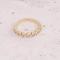 Detail of gold star ring with micro-pave white zircon stones on natural stone surface - Adjustable Open / Row of Stars Style (7#)