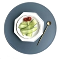 Round blue lychee grain faux leather placemat with white plate and gold spoon - Pressed Edge Faux Leather Round / Blue