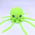 Fluorescent green octopus squeeze toy with a cartoon smile for kids bath time play - New Expression Green Octopus