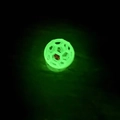 Luminous green hollow TPR dog toy ball with honeycomb structure and inner glowing core - Glow-in-the-dark with Bell
