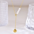 Elegante collana a farfalla dorata con quattro perle bianche e ciondolo portafortuna - Stile Caratteri