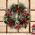 Artificial Christmas wreath with snowy pine needles, red berries, and pine cones on wood - 30cm Pinecone Style