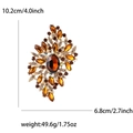 Spilla vintage dorata con cristalli ambra, misura 10,2x6,8cm e peso di 49,6g - Marrone