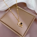 Titanium dolphin projection necklace with gold plating and zircon inlay in a jewelry box - Dolphin Projection Style / Gold (F520)