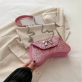 Chic pink sequin evening bag featuring a silver bow decoration and metal chain strap - Rose Pink