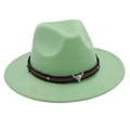 Detailed close-up of light green felt fedora hat with silver bull head and rivet band - Green