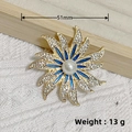 Golden sunflower brooch with white rhinestones, blue enamel, and a central pearl accent - KC Gold Sunflower