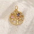 Golden Tree of Life pendant with colorful gemstones on a textured beige sand background - Tree of Life (A0069)