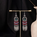 Detail view of Bohemian tassel earrings with red and blue beads on a golden stand - Red Blue Beaded Hollow Feather Style (E7667)