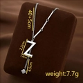 Silver titanium steel letter Z pendant necklace with tassel on jewelry display stand - Letter Z / Silver