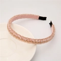 Detail of pink baroque headband with champagne crystal beads on white ceramic plate - Pink
