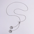 Collana lariat a doppio strato in argento con ciondoli a cuore e perla scorrevole - Color Acciaio