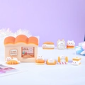 Cute Sweet Rabbit miniature bakery set with cartoon bunny figurines on purple background - Bread Cat Figurines + Piggy Bank