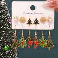 Christmas earrings set with golden snowmen, reindeer, and snowflakes on a display card - Style 29 (6 Pairs Set)