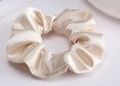 Elegant champagne satin scrunchie with a glossy silk-like texture and durable elastic band - Solid Satin Scrunchie - Champagne