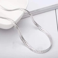 Elegant 5mm silver plated curb chain necklace displayed on a minimalist white surface - Necklace / Silver