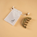 Sandalwood massage comb with beige linen pouch featuring elegant lotus illustration - Green Sandalwood - With Cloth Bag