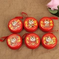 Set of 6 round red Christmas tin coin purses with festive cartoon horse patterns - Round Year of the Horse