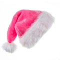 Pink plush Christmas hat with white fuzzy pompom and thick faux fur trim on white background - Pink
