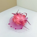 Elegant pink fascinator hat with silk flower, delicate feathers and mesh veil detail - With Alligator Clip / Rose Red