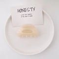 Minimalist cream white acetate hair claw clip on a minimalist white ceramic tray - White