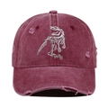 Distressed burgundy baseball cap featuring detailed white dinosaur skeleton embroidery. - Burgundy