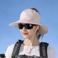 Women's light pink outdoor sun hat with wide brim and adjustable ponytail design - Sakura Pink