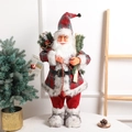 Standing 18-inch Santa Claus figurine in red and grey plaid with wooden skis and tree branches - 73cm*32cm