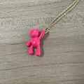 Fashionable golden necklace featuring a vibrant rose pink waving bear pendant - Large Bear / Rose Red