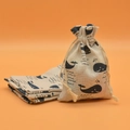 Cotton linen drawstring pouch and coasters with navy blue whale prints on orange background - Blue Whale