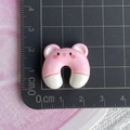 Macro detail of a 2cm resin bear charm showing precise measurements on a black cutting mat - Pink Bear U-shaped Pillow