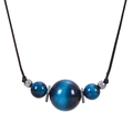 Close-up of blue tiger eye stones and metal beads on a black cord necklace - Blue Tiger Eye - Necklace