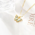 Elegant gold butterfly necklace with light green crystals and zircon accents - Plated Lake Blue