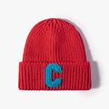 Winter red knitted beanie with blue letter C patch and thick ribbed texture - One Size / Red