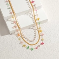 Collana a strati con catene dorate, perle e pietre naturali su basi in gesso - Collana a 3 strati