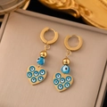 Boucles d'oreilles cœur mauvais œil doré avec perles bleues sur boîte à bijoux chic - [G3024] Boucles d'Oreilles Coeur Mauvais Oeil Dorées