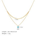 Dettaglio collana doppia in oro con ciondolo opale blu a goccia e dimensioni della catena - Oro
