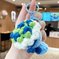 Handgefertigter Häkel-Schildkröten-Schlüsselanhänger mit blau-grünem Muster - Handstrauß-Blau
