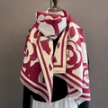 Classic red and beige jacquard cashmere-feel scarf with tassels worn by a model - New Camellia-Red