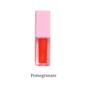 Glossy Pomegranate mirror lip glaze with pink cap and transparent tube in vibrant red - 12Pomegranate