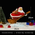 Resin Santa Claus on broom figurine with dimensions 26x11x20cm for holiday decoration - Magic Santa Claus on Broom