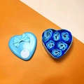Blue heart-shaped metal gift box with six soap roses and matching ribbon bow - 6 Pieces / Blue Mix